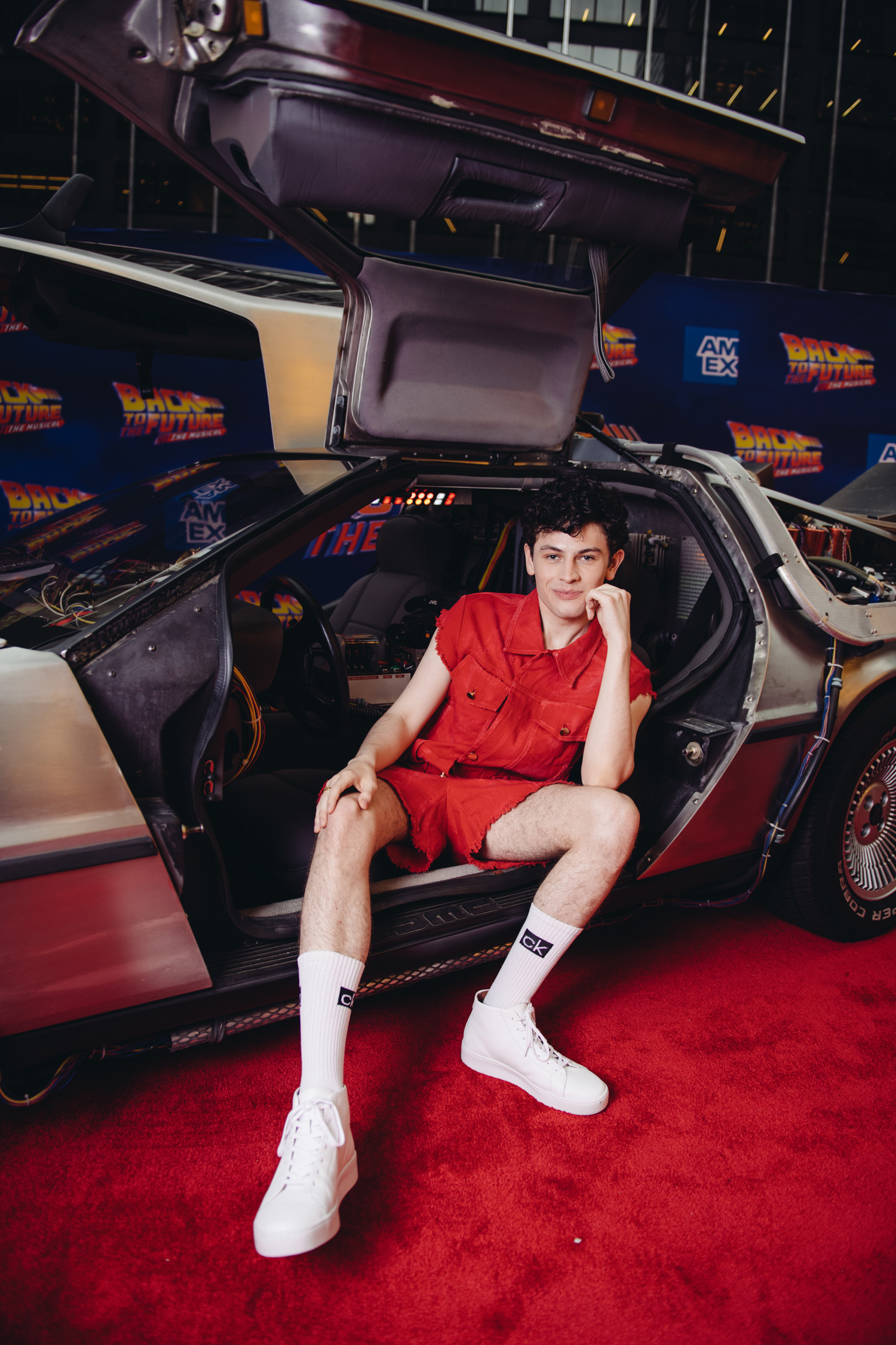 Casey Likes sitting in the DeLorean at the Back to the Future Musical Gala